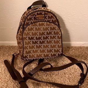 Michael Kors mini backpack with straps (GENTLY USED MAYBE TWICE) great condition